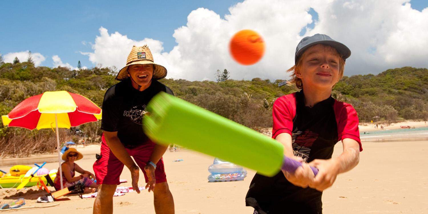 image of AARONTAIT COPYRIGHTED 2014 145 ADVERTISING LIFESTYLE BEACH ISLAND LIFE BEACH CRICKET FAMILY FUN AUSTRALIA SIX FOUR RUNS 