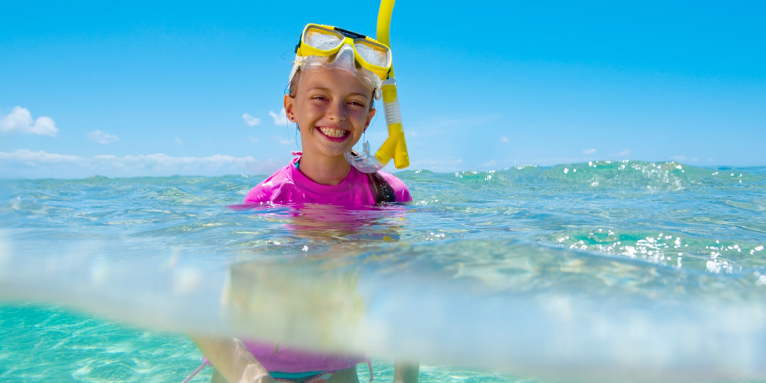 image of AARONTAIT COPYRIGHTED 2014 143 ADVERTISING LIFESTYLE BEACH ISLAND LIFE GIRL SNORKELLING UNDERWATER CLEAR NATURAL PINK SMILE HAPPY WET NATURAL LIGHT