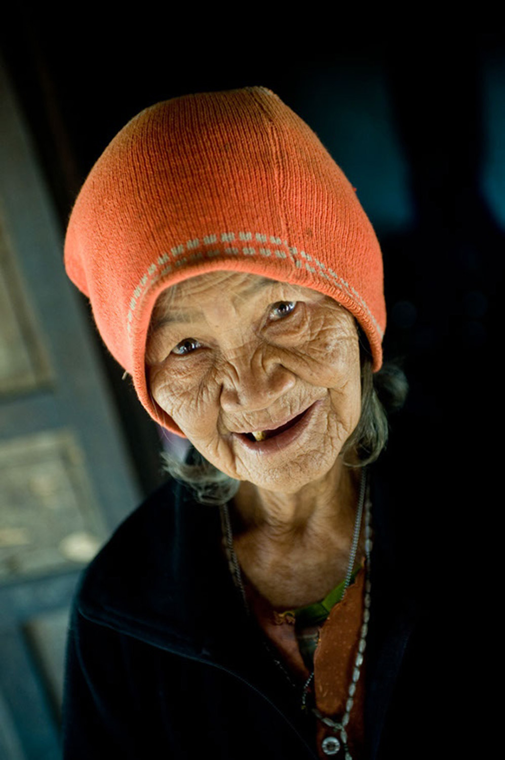 image of AARONTAIT COPYRIGHTED 2014 297I TRAVEL PHOTOGRAPHER ASIA REPORTAGE EDITORIAL STORY HUMANS LIFE EARTH TRAVELER EXPLORE CULTURE PEOPLE COUNTRY NATIONALITY DOCUMENTARY VIETNAM ELDER OLD LADY RURAL HAPPY 